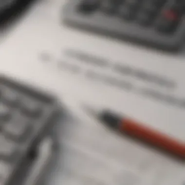 Close-up of a loan agreement with pens and a calculator