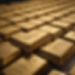 A close-up of a gold bar alongside gold mining stocks on a digital screen