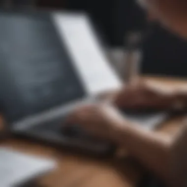 Engaging in Thoughtful Composition of Your Covering Letter Close-up of a person typing on a laptop with notes beside them.