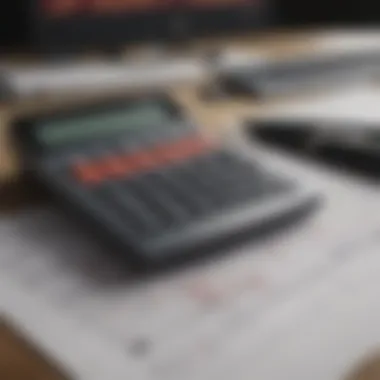 Calculator with Financial Graphs A calculator and financial graphs on a desk
