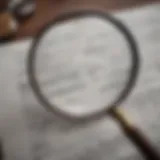 Magnifying glass examining bank statement